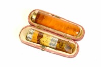 Two Amber Gold/Silver Mounted Cigarette Pipes