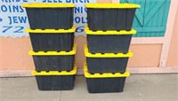 Eight 27 gallon tough totes with lids