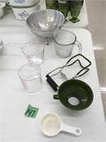 strainer, measuring cups, canning jar holder