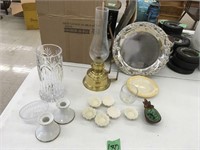 metal tray, kerosene lamp, candle holders, vase
