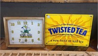 Notre Dame clock and twisted tea sign