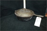 Deep covered cast iron skillet