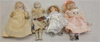 Lot of 4 vintage small dolls