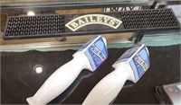 Pair of blue moon tap handles and a Bailey's  mat