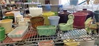 Shelf of Various Size Pottery Planters