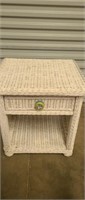 White wicker outdoors side table