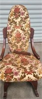 Vintage wood and upholstered rocking chair