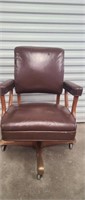 Leather and wood 4 wheel office chair