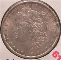 1884-O Morgan Silver Dollar.