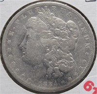 1884-O Morgan Silver Dollar.