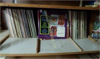 Shelf full of assorted music