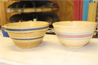 Two Tan Mixing Bowls one with blue & white trim