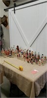 Lot of old glass bottles and 2 pepsi cola glasses