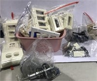 LARGE LOT OF OUTLET COVERS SWITCHES DOORSTOP