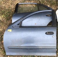 Pair of Blue Car Doors for Unknown Vehicle