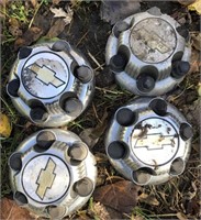 Lot of 4 Chevy Hubcaps