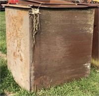 Large Metal Bucket Contains Metal Piping.