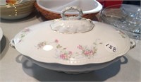 Covered china serving piece