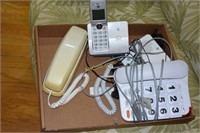 Box lot of telephones & power strip