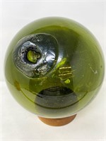 Glass fisherman float green colored