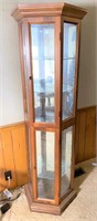 6 ft lighted curio cabinet- good condition