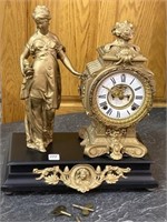 Antique Keywind Statue Clock on Ornate Base