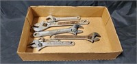 Flat of adjustable wrenches