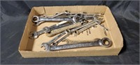 Flat of ratchet wrenches and some regular