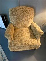 Brown and tan upholstered recliner
