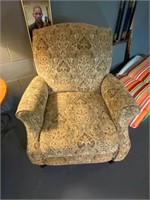 Brown and tan upholstered recliner