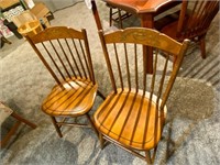Pair of  wood chairs with folk art drawing on back