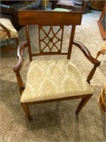 Tan upholstered wood chair