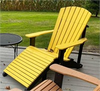 Yellow Adirondack chair with leg rest