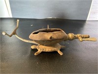 Antique warmer with turtle base