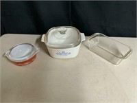 2 PYREX DISHES  WITH LIDS   1 CORNING WARE
