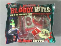 BLOODY BITES PLASTIC FANGS WITH OOZING CANDY