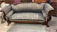 Newly upholstered antique sofa, with two matching