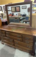 8 drawer dresser with a top mirror that can be