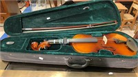 Austin Bazaar violin in a soft side case, with a