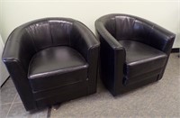 (4) BLACK NAUGEHYDE BARREL CHAIRS...