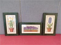 SET OF (3) SMALL FRAMED PRINTS OF FLOWERS....