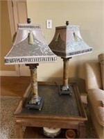 Two lamps. Appear to be marble