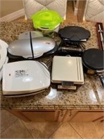Miscellaneous kitchen gadgets including waffler