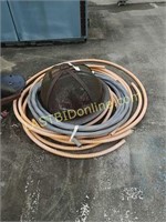 Coated cable, flex pipe, old fire pit