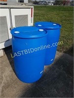 2 blue poly 55 gallon drums barrels