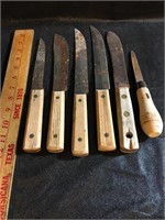 Six butcher Knives and one oyster knife.