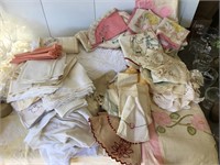 White bedspread, linen napkins, large assortment