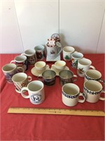 Sixteen cups and a mug.