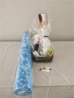 Gift basket with foam roller, exercise bands etc.