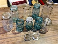 9 antique sealer jars